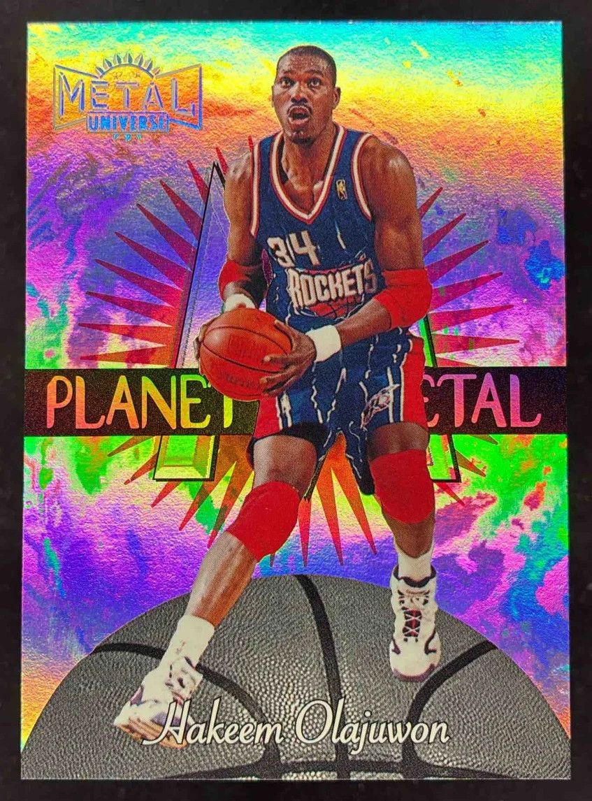 1997-98 Skybox Metal Universe Planet Metal #12 PM Hakeem Olajuwon