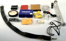 MISC. CAMERA ACCESSORIES, TRIPOD ACCS., STRAPS, FILM CANS.. ETC.