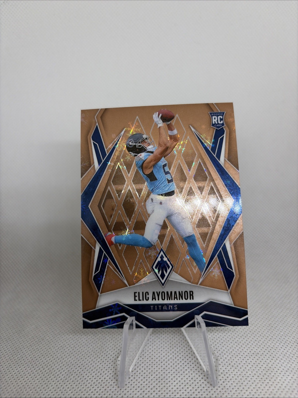 2025 Panini Phoenix - Rookies Elic Ayomanor #167 Bronze Winter /50 (RC)