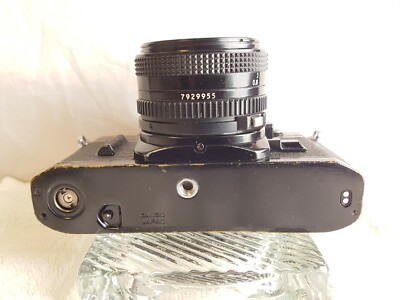 Black Version Canon AE-1 Camera with Canon FD 50mm f1.8 Lens for