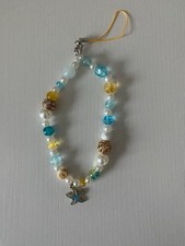 Beaded phone lanyard beach themed with starfish charm and gold accents