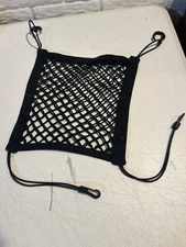 Car Cargo Net.  Between Seats or Back of the Seat. 12"x11".  Corner Bungee Clips