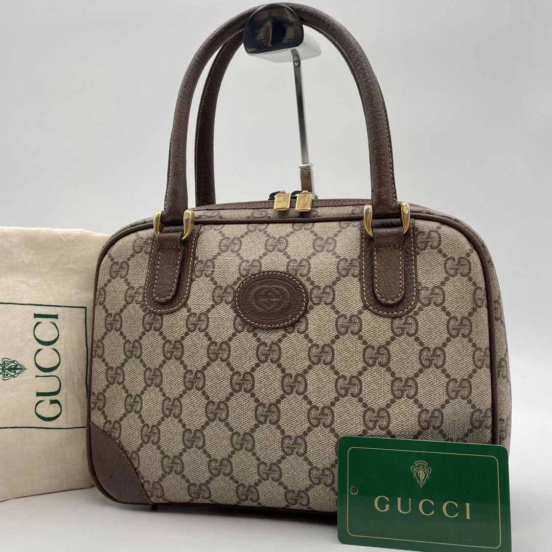 Sac à main Gucci GG cuir PVC emboîté accessoires luxe occasion