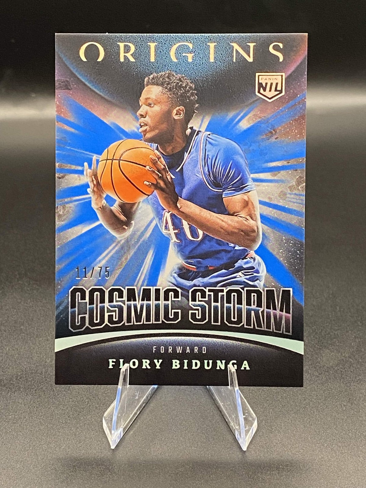 2025-26 Panini Origins Basketball - Flory Bidunga #1 Cosmic Storm Blue /75 NIL