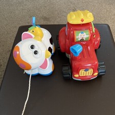 2 Toys a Toys R Us Cow,V Tech Farm Learn Animal Wagon