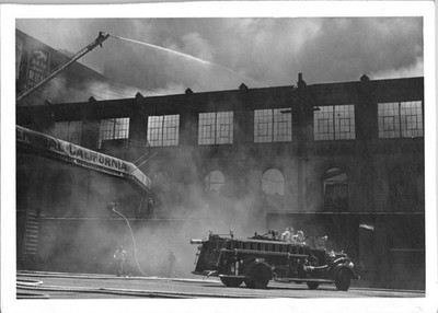 Firefighters trying to put out fire at a warehouse in CA Found Photo V0728