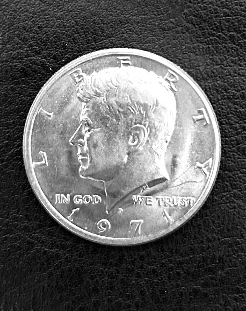 1971-D Kennedy Half Dollar Mint Error – Die Break / Cud Below
