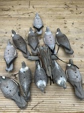 For sale 11  Pigeon decoys 8 shells 3 full body with assorted spikes and springs