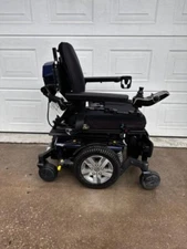 Quantum Edge Power Chair, Tilt/Recline Seating, Power Legrest Foot Platform.