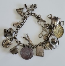 VINTAGE 1940S SILVER CHARM BRACELET WITH 14 CHARMS 7