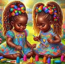 BABY GIRLS PLAYING ON THE GRASS