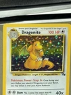 Dragonite Pokémon Fossil Holo Unlimited 4/62 WOTC Creased Damaged- Hp See Pics