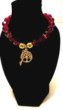 8 1/2 Bracelet Red Burgundy Glass Beads And Key and peace Charms, Gold Spacers