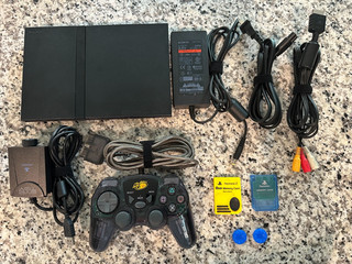 Pacchetto console Sony Playstation PS2 Slim. Testato. Funziona benissimo. Pulito