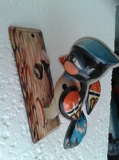 Specht am Baumstamm .beweglich . Blech . bespielt aus Deko. Aufzug. gebr.