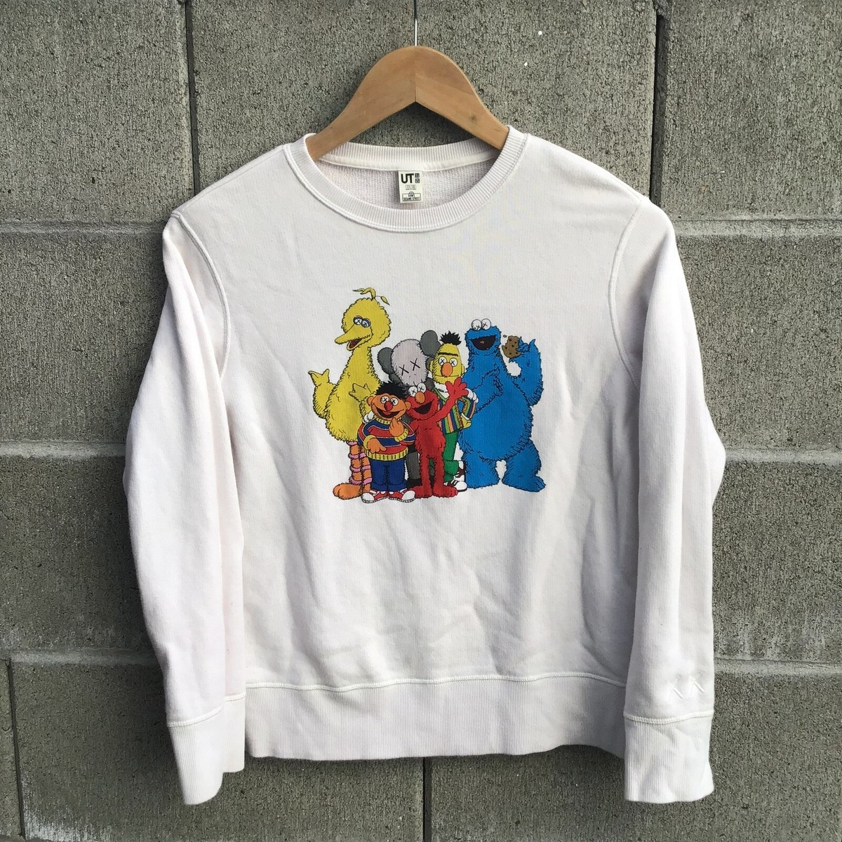 Kaws x Uniqlo x Sesame Street white crewneck sweater youth Kaws x Uniqlo x Sesame Street white crewneck sweater youth