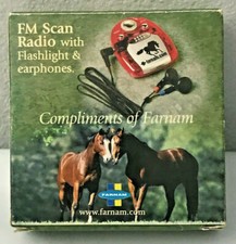 NEW FM SCAN RADIO WITH FLASHLIGHT  EARPHONES NEW IN PACKAGE NIP