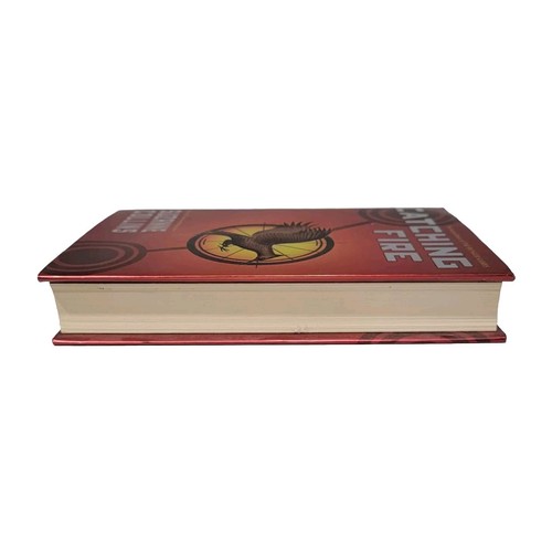 The Hunger Games Book by Suzanne Collins Catching Fire and Mockingjay Hardcover - Imagen 14 de 15