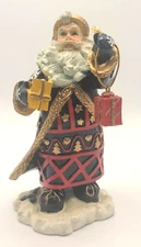 Vintage Resin Traditional Santa Claus  With Toys Dress in Black Cloak With Gold