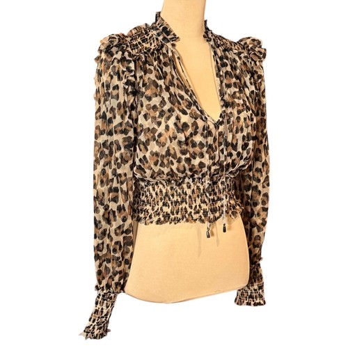 Top Twyla Free People stampa leopardata taglia XS maglia ritagliata volant affumicato mob moglie - Foto 12 di 13