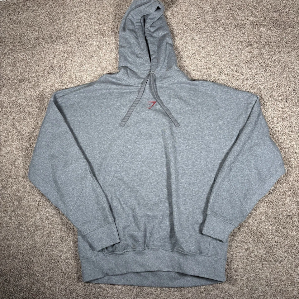 Conjunto de sudadera con capucha y joggers de lana mediana para hombre Gymshark gris gimnasio deletreado Foto 2 de 4