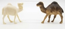 2 Vintage Toy Camel Figurines 1 Brown Celluloid . 1 White Hard Plastic