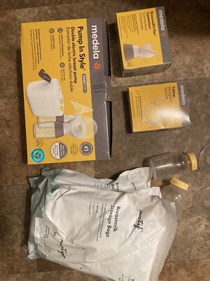 (HOT DEAL) **BRAND NEW** Medela electric breast pump with replacement parts/bags
