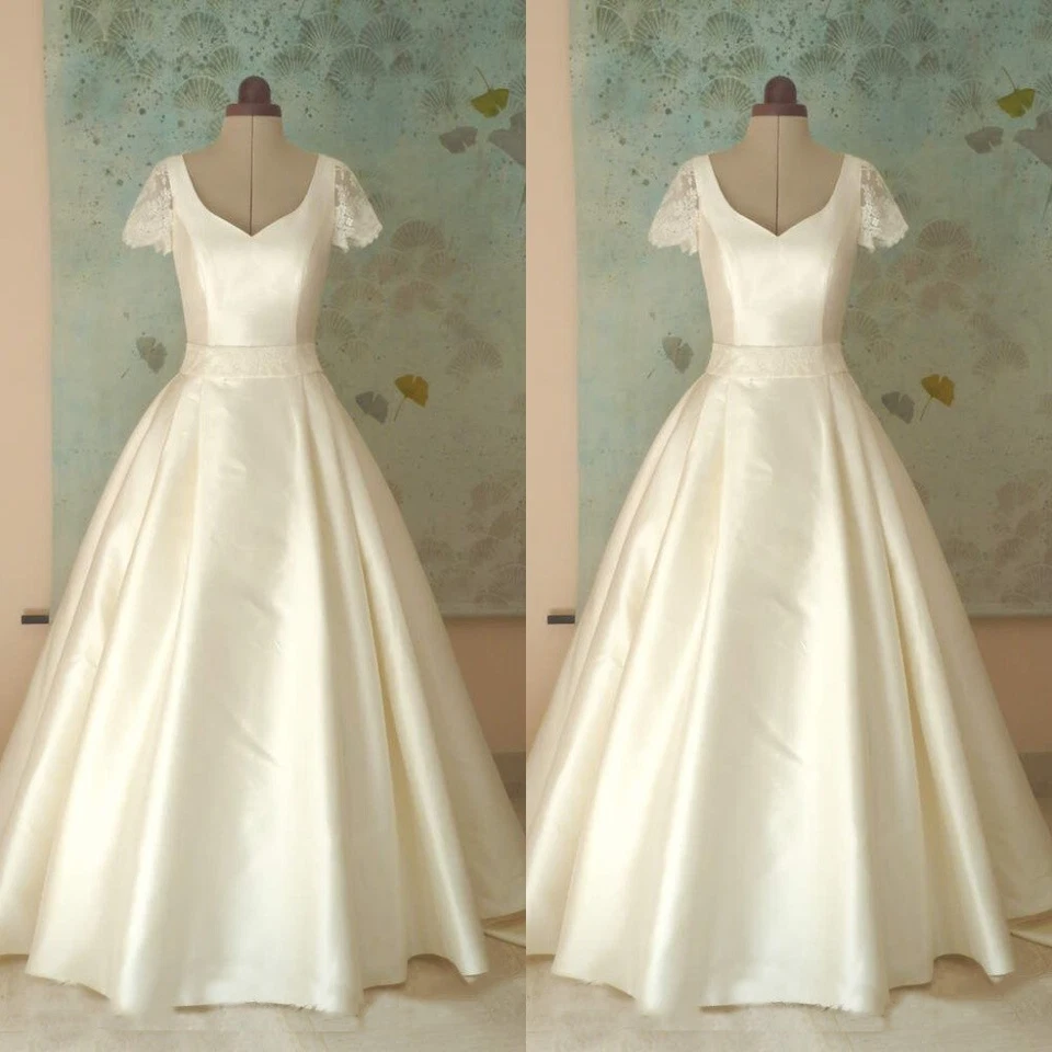 Vestidos de novia retro vintage años 80 manga corta satinado línea A Foto 3 de 4