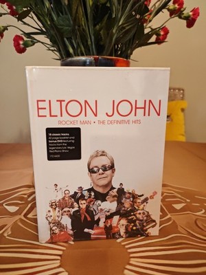 Elton John - Rocket Man: The Definitive Hits (Deluxe Book +DVD) CD NEW SEALED