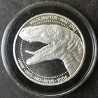 1oz Silver Dinosaur Round in a Capsule