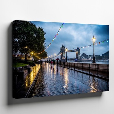 Rainy Evening Scene Along The Thames In London, Featuring The Iconic Wall Art