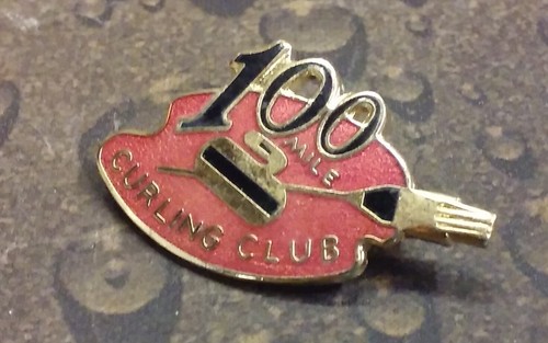 The 100 Mile Curling Club vintage pin badge