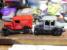 2 heavy vintage cast iron cars