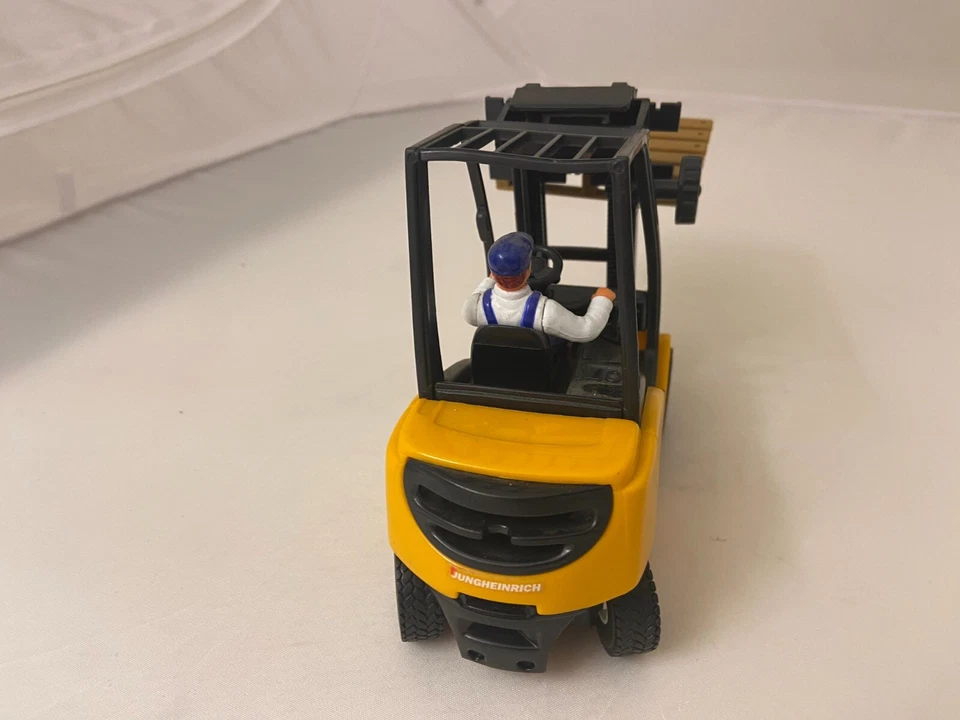 CONRAD JUNGHEINRICH FORKLIFT TOY WITH DRIVER FIGURINE RARE COLLECTIBLE PLASTIC - Image 3 of 4