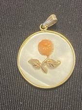 vintage mother-of-pearl and coral rose pendant with a gold-plated Edging