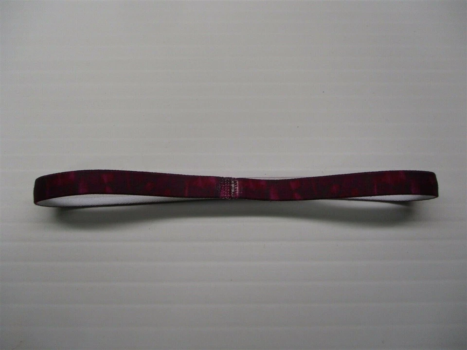 Diadema elástica rosa/púrpura Nike para mujer entrenamiento atlético Foto 3 de 4