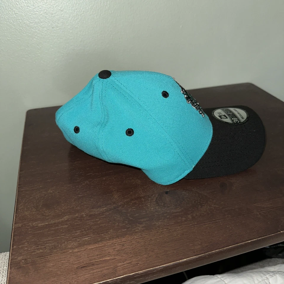 Chapéu ajustável verde Harry Potter Sonserina Crest New Era 39Thirty - Imagem 3 de 4