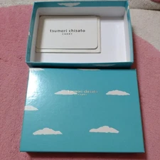 Tsumori Chisato empty box clouds light blue