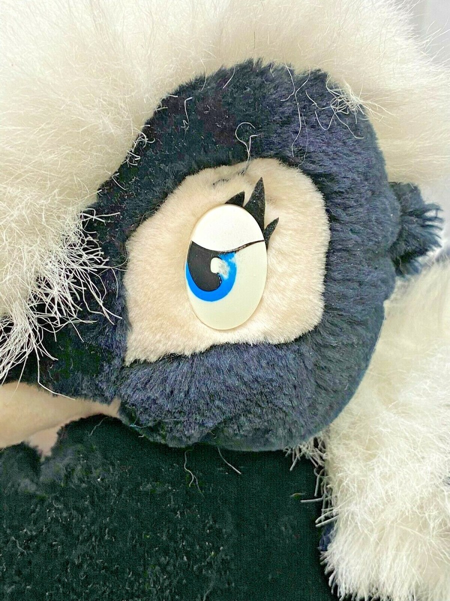 Flower The Skunk Plush Toy - 9 Inch Stuffed Animal Holding Bouquet, Soft & Cute Collectible