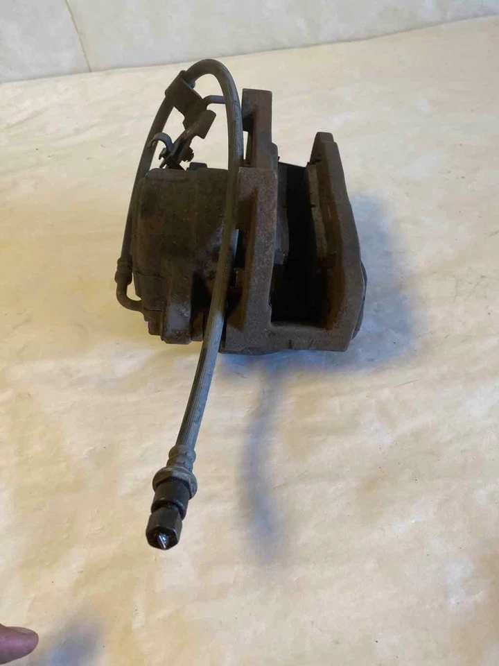 Pinza de freno de disco delantera Dodge Magnum 2005-2008 lado del conductor izquierdo LH G Foto 4 de 4