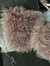 Light pink cushion covers 2 fluf y 2 plain 2 viole curtains