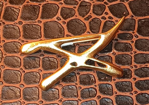 Salvador Dali Signature Brooch from the collection of the Salvador Dali Museum