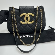 Chanel Black Lambskin Handbag Gold Interlocking Double C Metal Hardware
