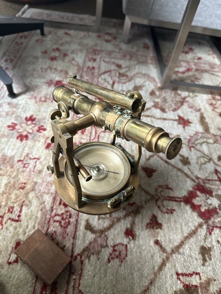 A full brass W. & L. E. Gurley engineer's transit with its original case — one of the most visually stunning American scientific instruments ever made, and a true heirloom piece.
