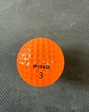 PING ORANGE AND WHITE VINTAGE GOLF  BALL. NEVER USED