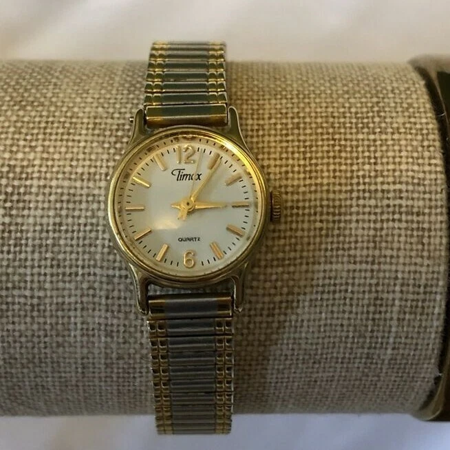 Timex gold top and silver watch