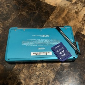 Nintendo 3DS Handheld System Aqua Blue 5 Games Charger 2GB Memory Card Case