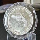 SMITH & WESSON FINE SILVER ART ROUND FEATURING THE MODEL 19 REVOLVER