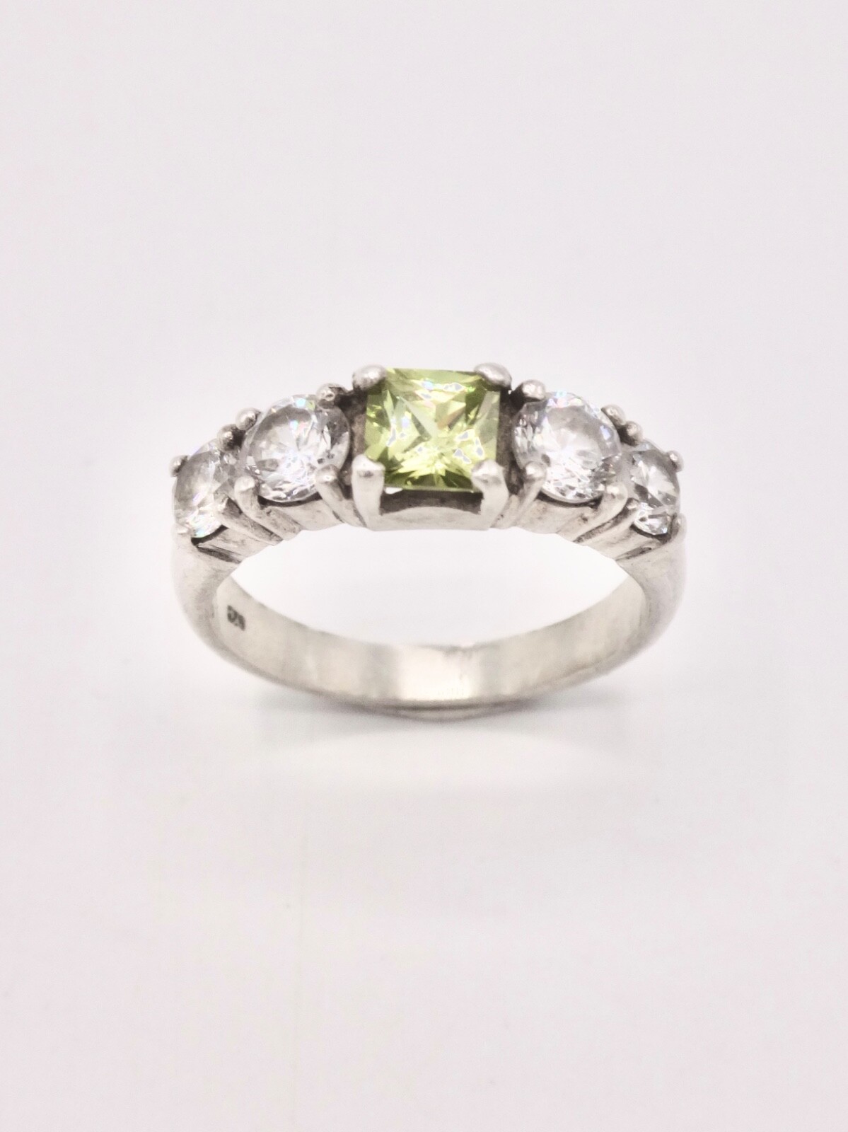 Solid Silver Ring Set with Peridot and Zircons - image 1