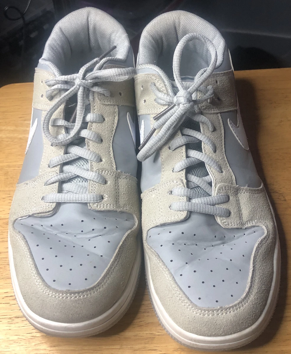 White nike shoes with grey swoosh top
